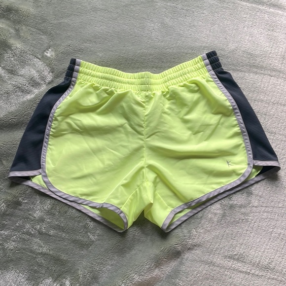 Women’s xs neon yellow Danskin Now athletic shorts - Picture 1 of 3